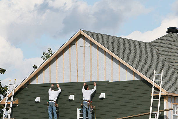 Professional Siding technician working in Clinton, MD